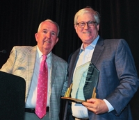 Tom Reahard is awarded the <a href='https://www.supportstjosephs.org/lougrubbfriendsforegolf' target='_blank' rel='noopener noreferrer' className='btn-text'>Lou Grubbs Friends Fore Golf Spirit Award</a>